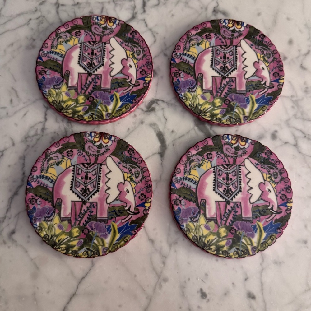 Ceramic elephant coasters, set of four, like new.